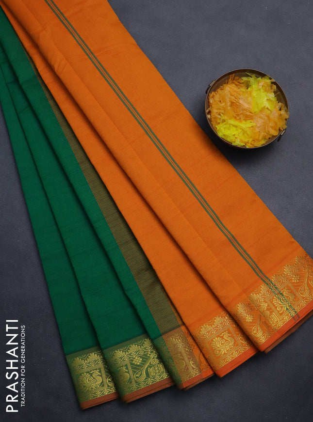 Semi silk cotton saree green and orange with plain body and zari woven border