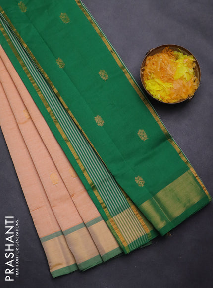 Semi silk cotton saree pale orange and green with zari woven buttas and zari woven border