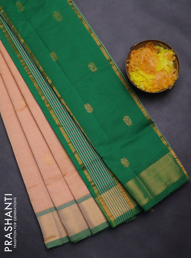Semi silk cotton saree pale orange and green with zari woven buttas and zari woven border