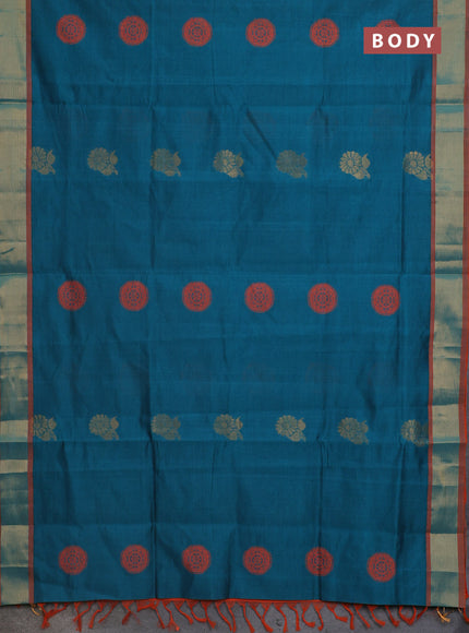 Semi silk cotton saree peacock green and orange with zari woven floral buttas and zari woven border