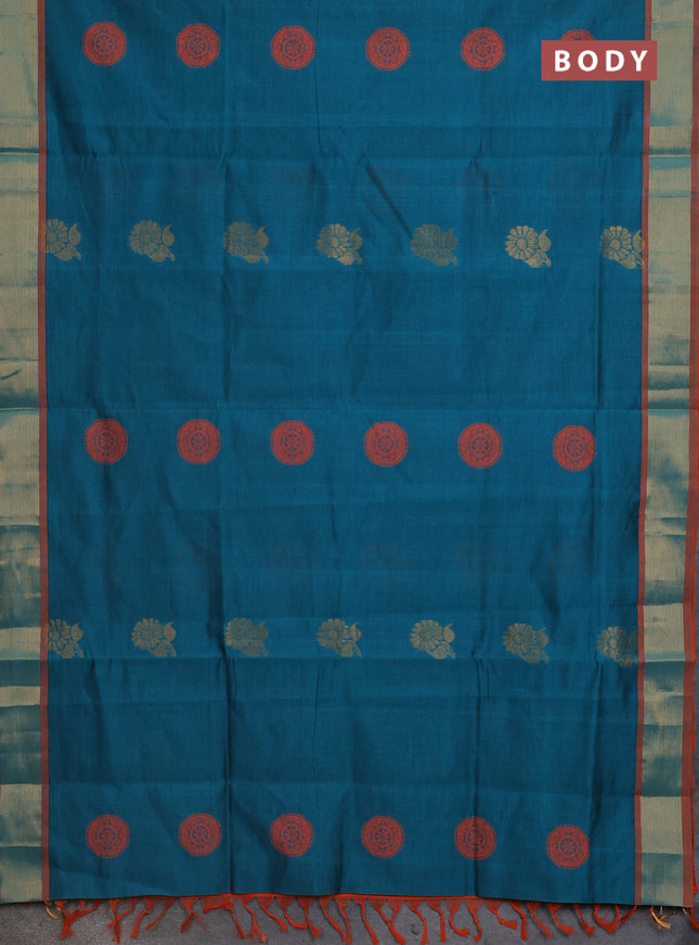 Semi silk cotton saree peacock green and orange with zari woven floral buttas and zari woven border