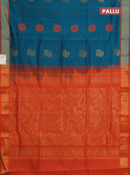 Semi silk cotton saree peacock green and orange with zari woven floral buttas and zari woven border