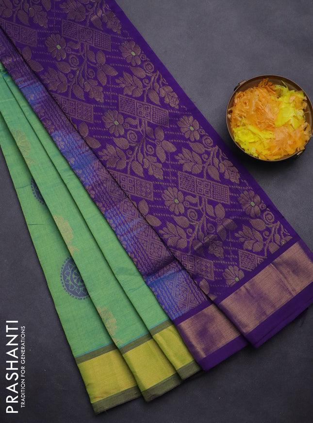 Semi silk cotton saree dual shade of green and violet with zari woven floral buttas and zari woven border