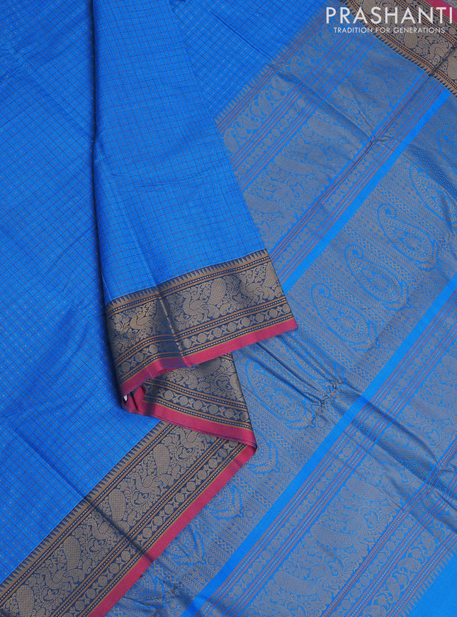 Kanchi cotton saree blue and red with allover lakshadeepam weaves and thread woven border