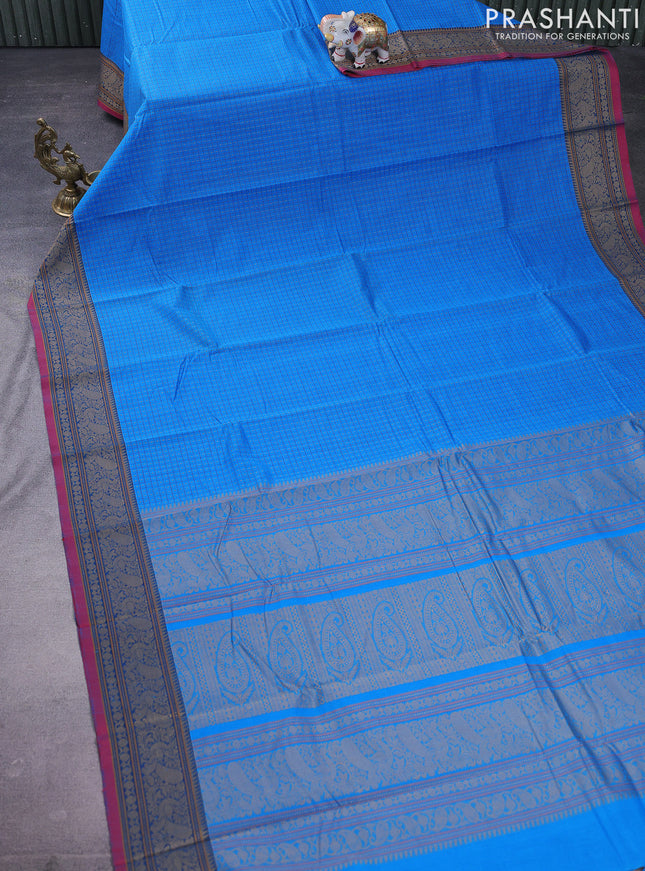 Kanchi cotton saree blue and red with allover lakshadeepam weaves and thread woven border