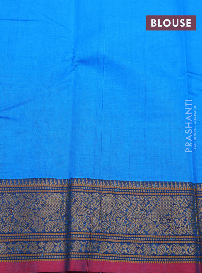 Kanchi cotton saree blue and red with allover lakshadeepam weaves and thread woven border