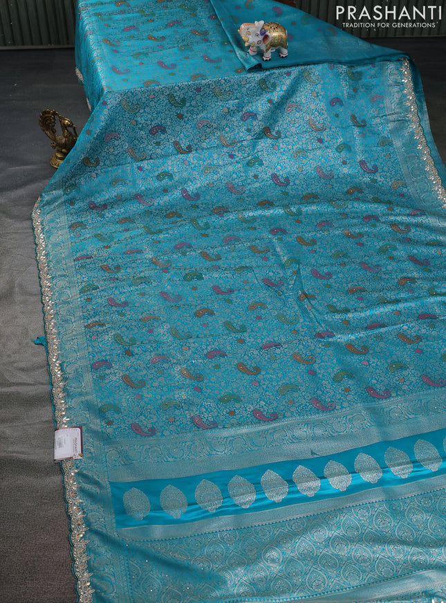 Banarasi silk saree teal blue shade with allover zari woven brocade weaves and zaridosi gotapatti work border