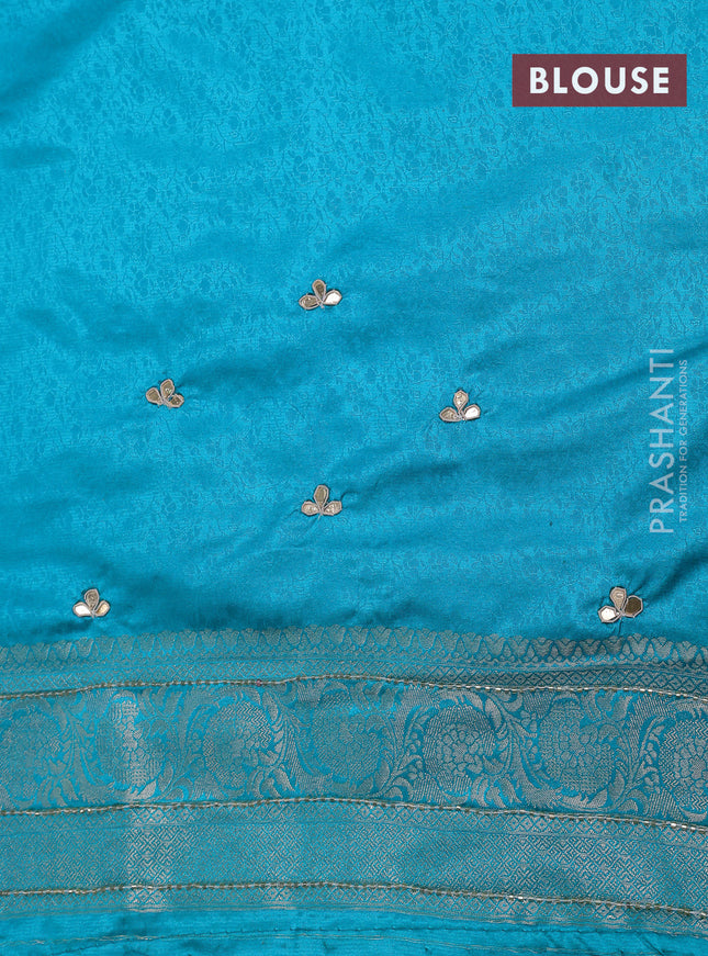 Banarasi silk saree teal blue shade with allover zari woven brocade weaves and zaridosi gotapatti work border
