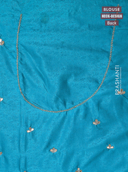 Banarasi silk saree teal blue shade with allover zari woven brocade weaves and zaridosi gotapatti work border