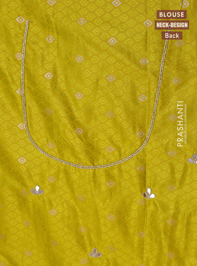 Banarasi silk saree lime yellow with allover zari woven brocade weaves and zaridosi gotapatti work border