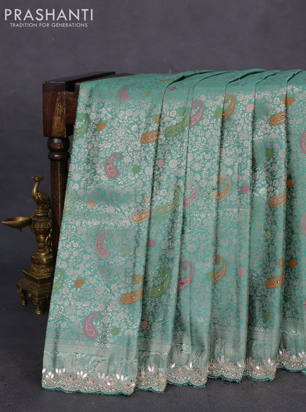 Banarasi silk saree pastel green with allover zari woven brocade weaves and zaridosi gotapatti work border