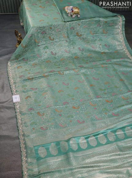 Banarasi silk saree pastel green with allover zari woven brocade weaves and zaridosi gotapatti work border
