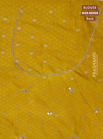 Banarasi silk saree mustard yellow with allover zari woven brocade weaves and zaridosi gotapatti work border