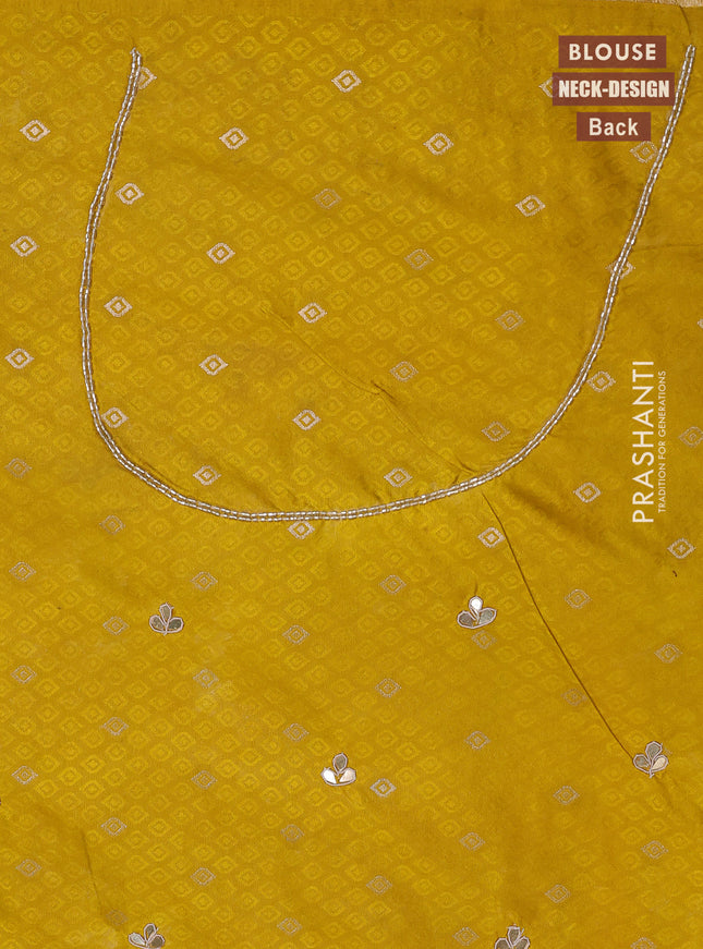 Banarasi silk saree mustard yellow with allover zari woven brocade weaves and zaridosi gotapatti work border
