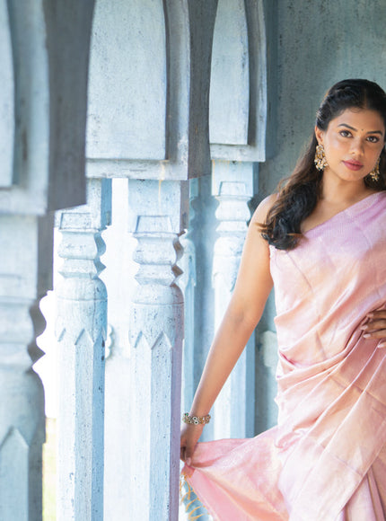 Pure kanchipuram silk saree pastel pink with allover silver zari woven brocade weaves in borderless style