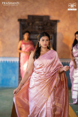 Pure kanchipuram silk saree pastel pink with allover silver zari woven brocade weaves in borderless style
