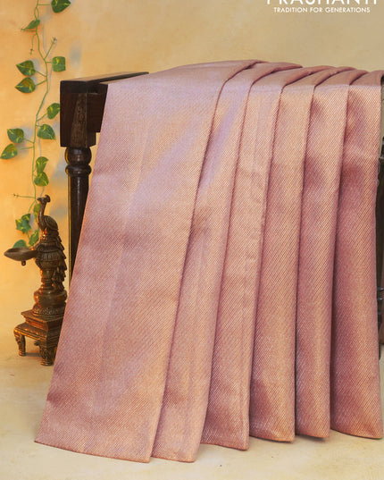 Pure kanchipuram silk saree pastel pink with allover silver zari woven brocade weaves in borderless style