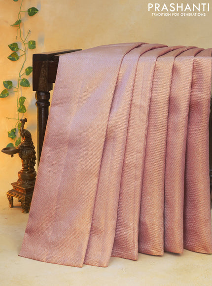 Pure kanchipuram silk saree pastel pink with allover silver zari woven brocade weaves in borderless style