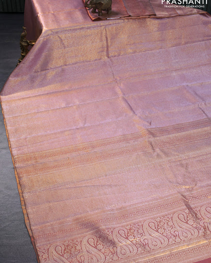 Pure kanchipuram silk saree pastel pink with allover silver zari woven brocade weaves in borderless style