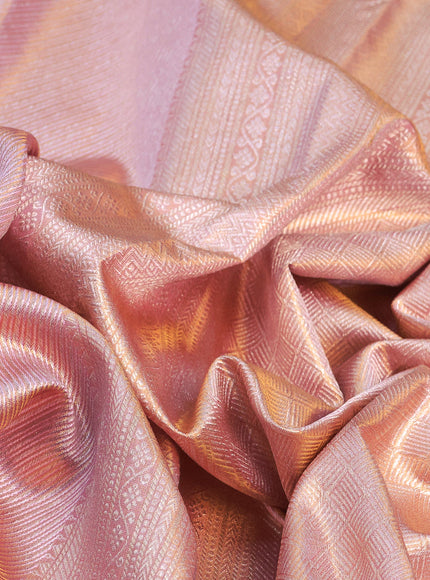 Pure kanchipuram silk saree pastel pink with allover silver zari woven brocade weaves in borderless style