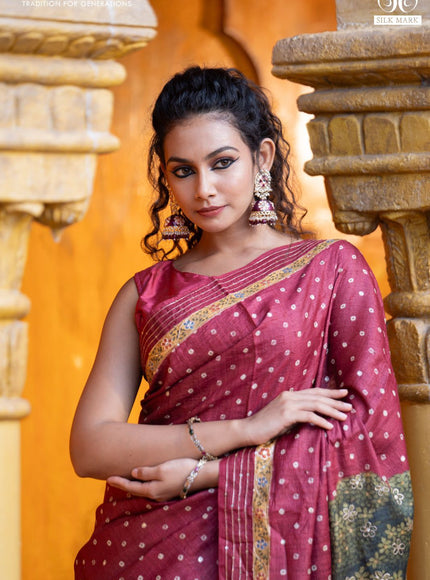 Pure tussar silk saree maroon with allover bandhani butta prints & pita work and zari line border