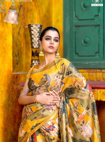 Pure tussar silk saree mustard yellow with allover digital pichwai prints & pita work and zari line border