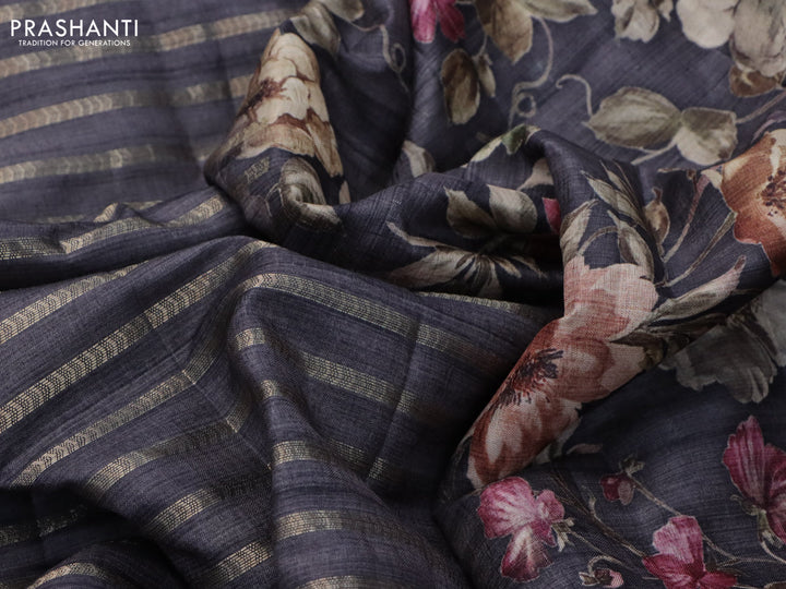 Semi tussar saree grey shade with allover zari woven stripes pattern and floral printed border