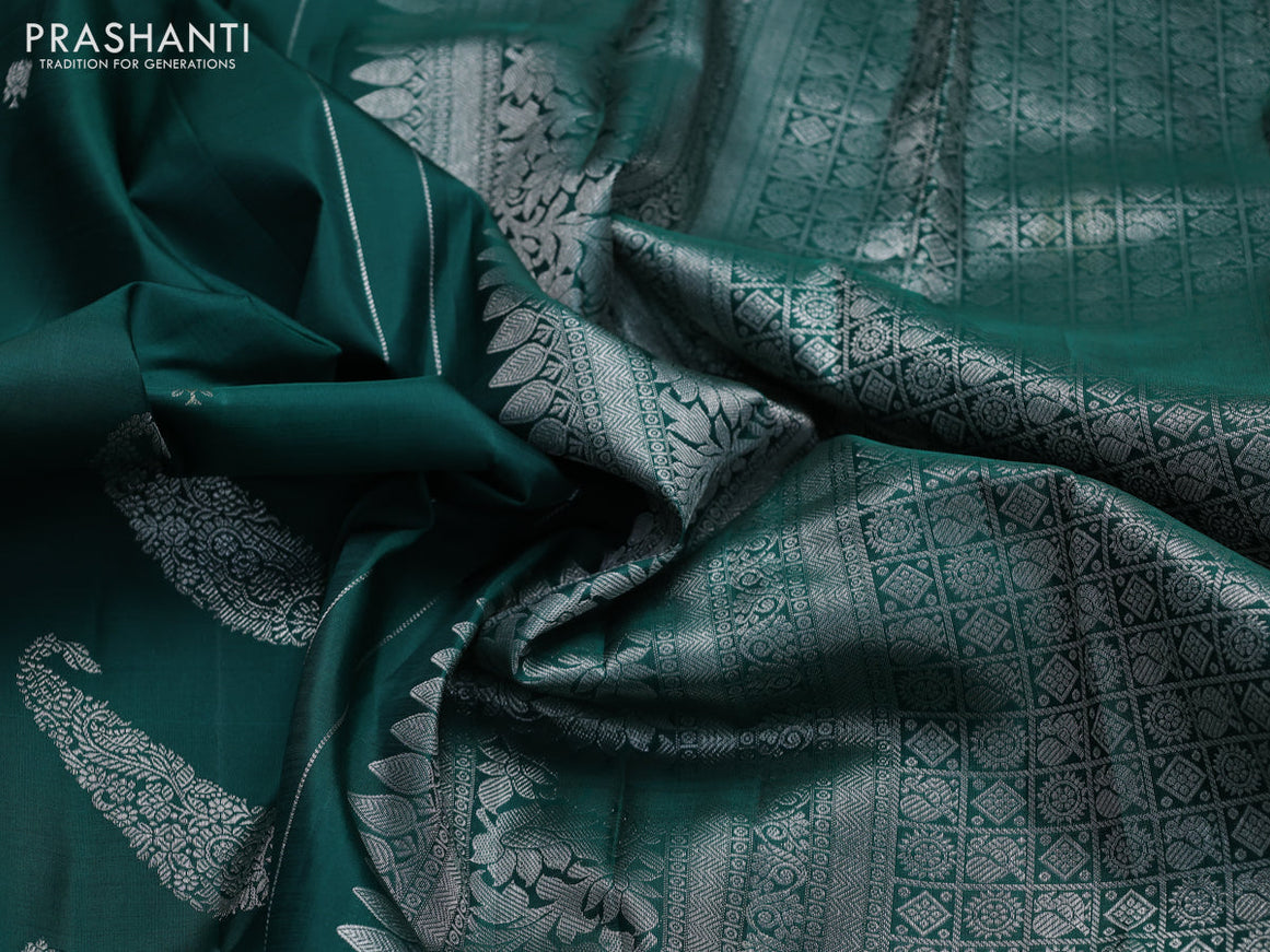 Pure kanchipuram silk saree green and wine shade with allover silver zari woven paisley buttas in borderless style