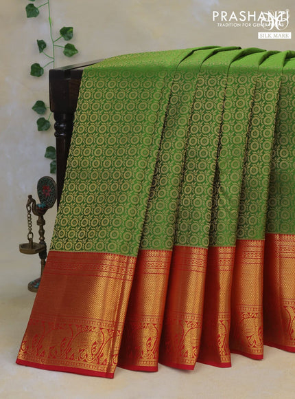 Pure kanchipuram silk saree green and red with allover zari woven brocade weaves and long rich zari woven border