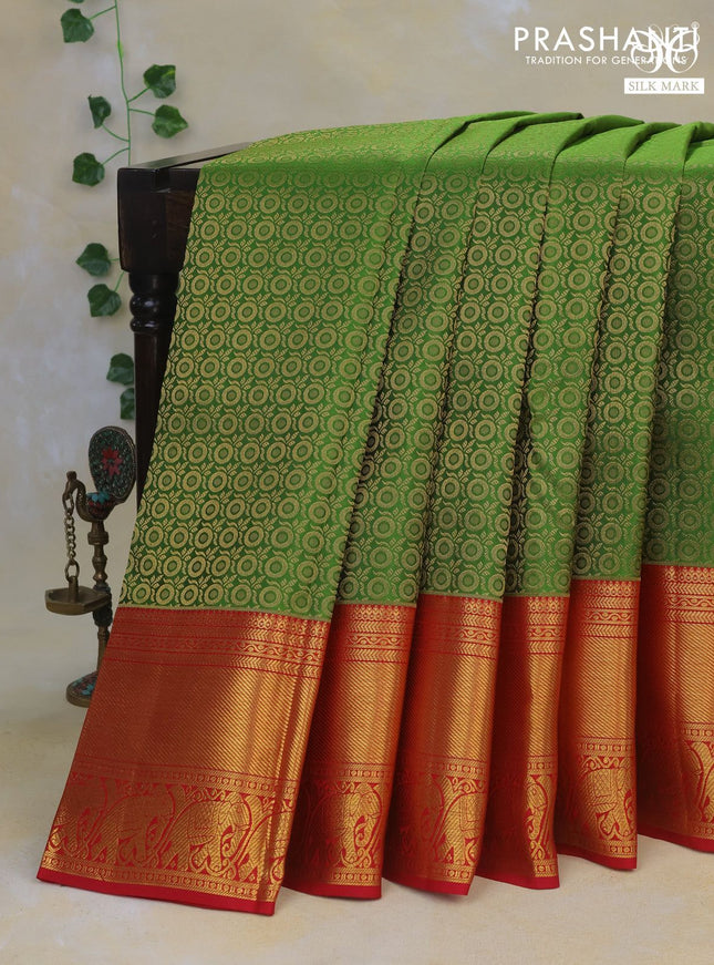 Pure kanchipuram silk saree green and red with allover zari woven brocade weaves and long rich zari woven border