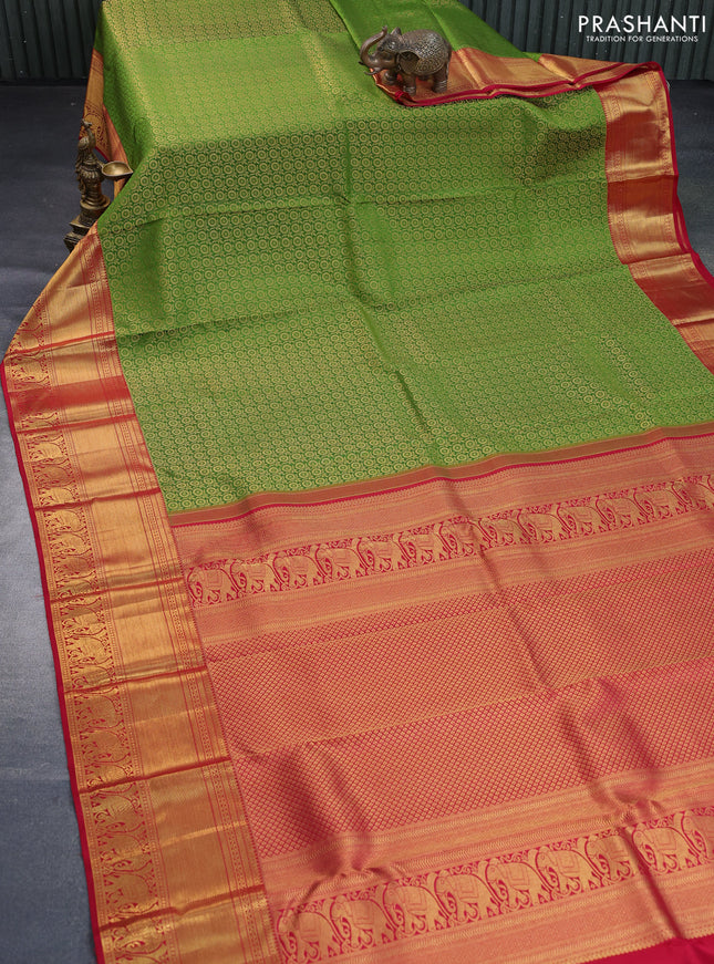Pure kanchipuram silk saree green and red with allover zari woven brocade weaves and long rich zari woven border