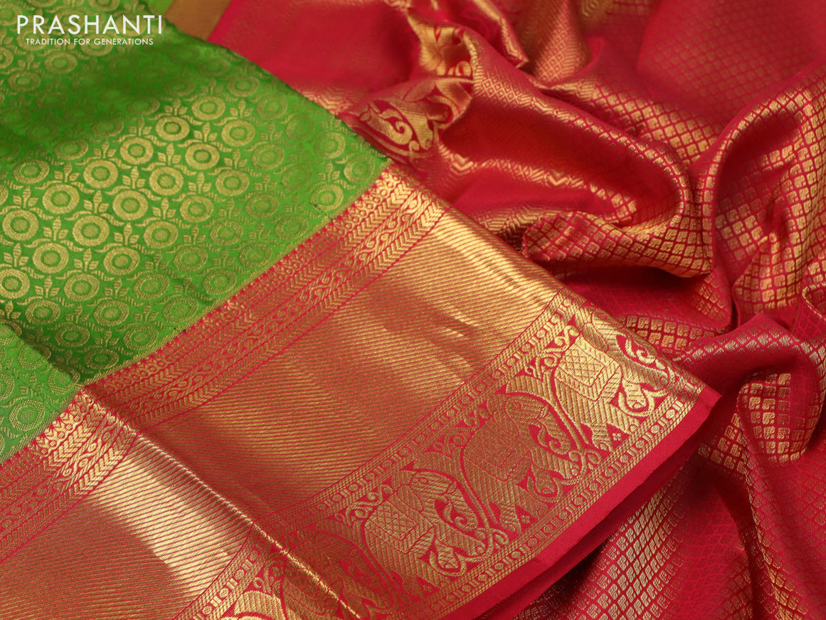 Pure kanchipuram silk saree green and red with allover zari woven brocade weaves and long rich zari woven border