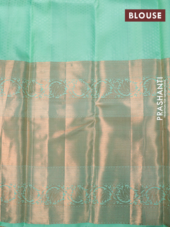Pure kanchipuram silk saree green shade with allover zari woven butta weaves and long rich zari woven border