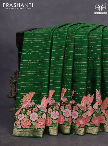 Pure crepe saree green with allover zari weaves & embroidery work and zari woven border