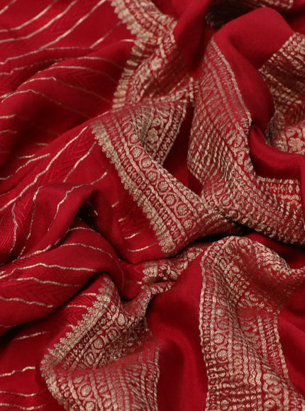 Pure crepe saree red with allover zari weaves & embroidery work and zari woven border