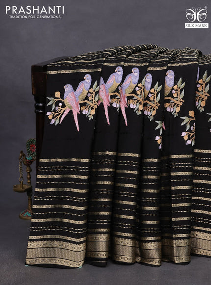 Pure crepe saree black with allover zari weaves & embroidery work and zari woven border