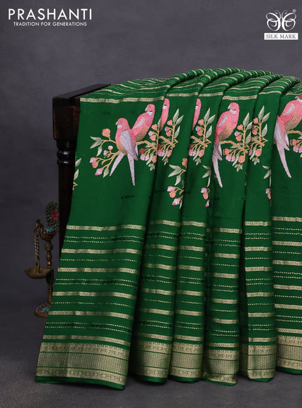 Pure crepe saree green with allover zari weaves & embroidery work and zari woven border