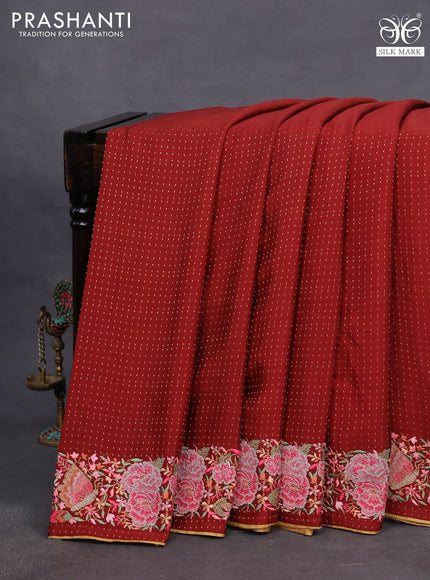 Pure crepe saree maroon shade with allover zari woven butta weaves and embroidery work border
