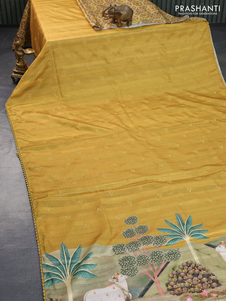 Semi tussar partly saree mustard shade with thread woven buttas & ajrakh prints and lace work border & pichwai printed pallu