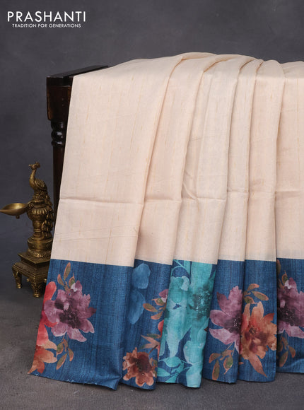 Semi tussar saree cream and peacock blue with plain body and floral digital printed border