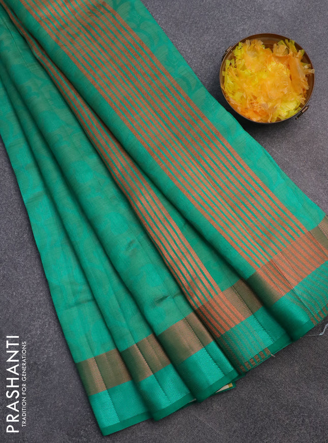 Semi raw silk saree teal green with allover self emboss and zari woven border