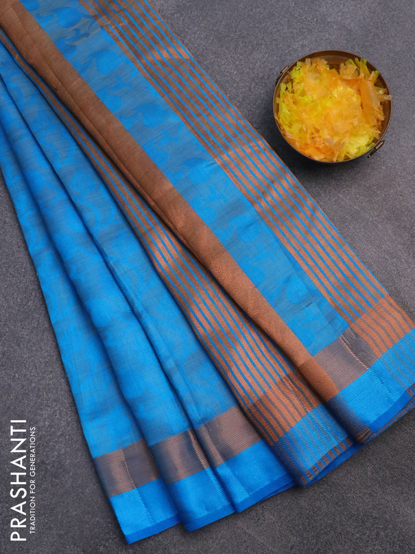 Semi raw silk saree blue with allover self emboss and zari woven border