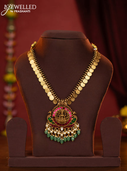 Jadau kaasu necklace lakshmi pendant with jadau stones and green beads hanging