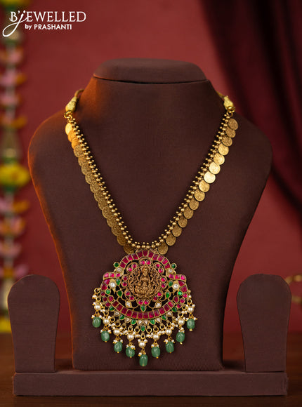 Jadau kaasu necklace lakshmi pendant with jadau stones and green beads hanging