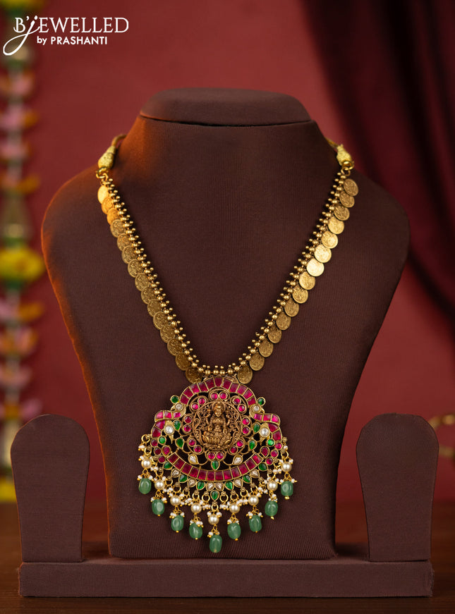 Jadau kaasu necklace lakshmi pendant with jadau stones and green beads hanging