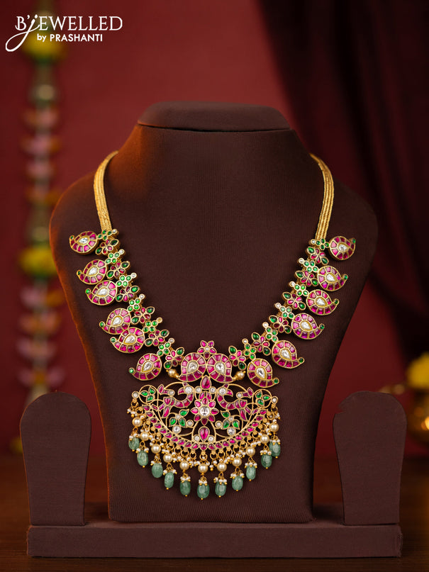 Jadau maanga necklace floral pendant with jadau stones and green beads hanging