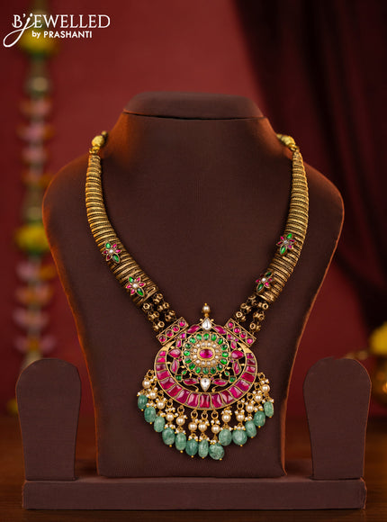 Jadau kanti necklace with jadau stones and green beads hanging