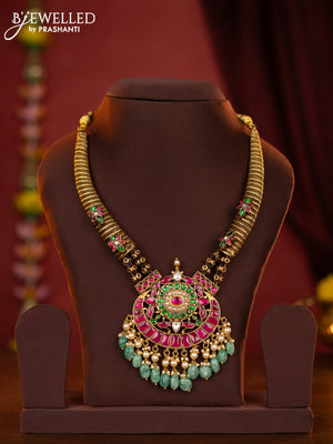 Jadau kanti necklace with jadau stones and green beads hanging