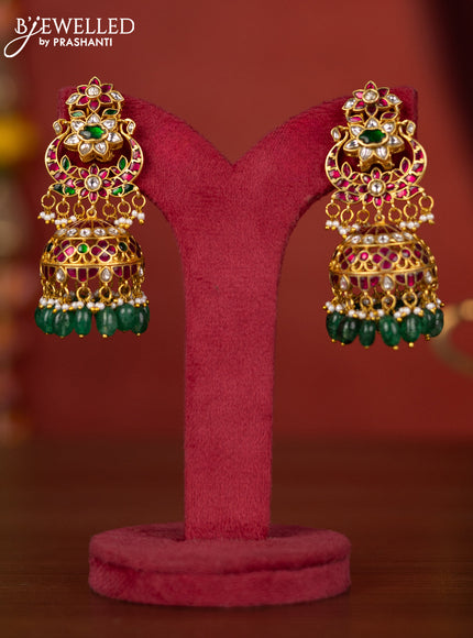 Jadau jhumka floral design with jadau stones and green beads hanging