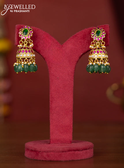 Jadau jhumka floral design with jadau stones and green beads hanging